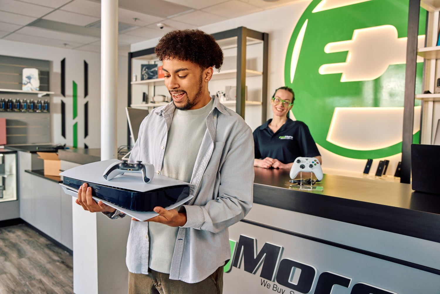 customer smiling after buying a gaming console